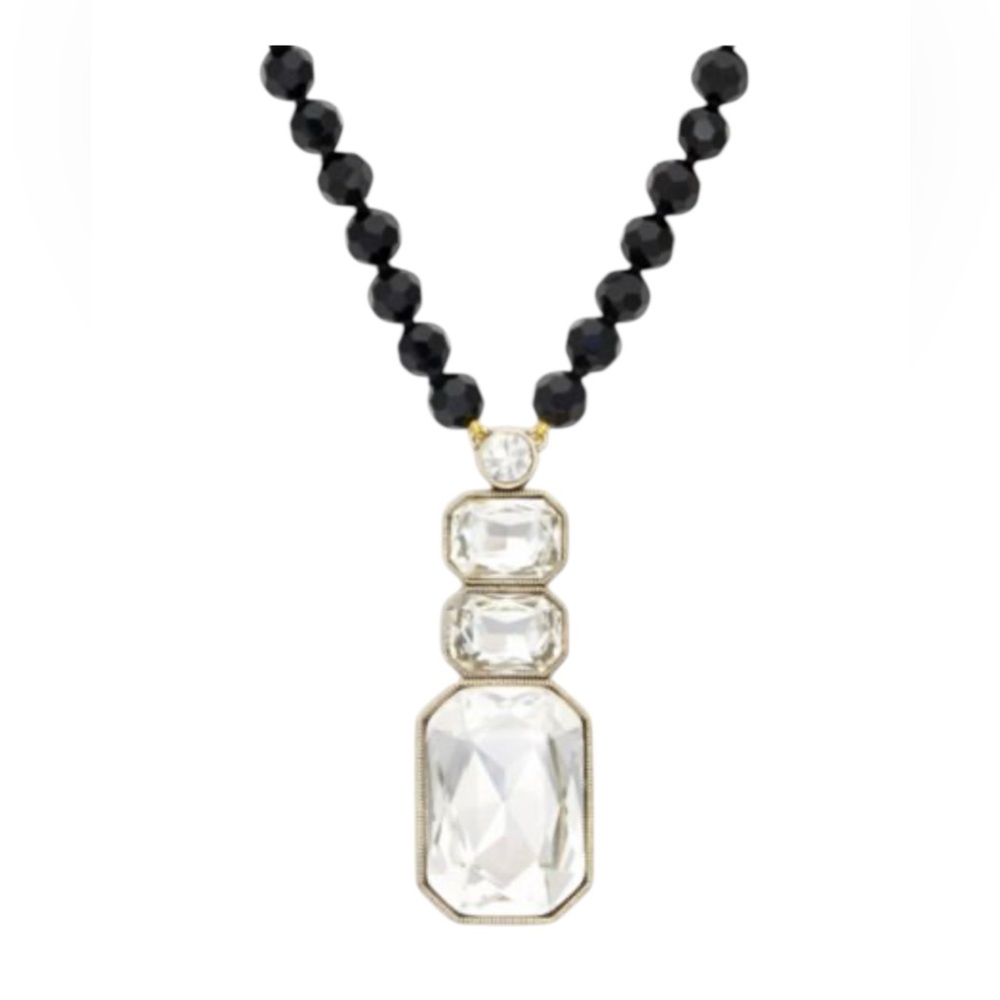 Elegant HEIDI DAUS
Ice Single Strand Pendant Necklace Black and Gold Necklace
